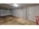 View of the attached garage with an automatic door, storage space, and access to the interior of the home at 8150 E Mitchell Dr, Scottsdale, AZ 85251