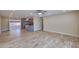 Open living space with tile floors adjacent to the kitchen, perfect for entertaining at 8150 E Mitchell Dr, Scottsdale, AZ 85251