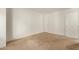 Bright, neutral bedroom with large windows, ample closet space, carpet, and neutral walls at 8841 S 48Th St # 1, Phoenix, AZ 85044