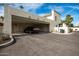 Spacious carport featuring two parking spots and convenient access to the home's entrances and storage at 8841 S 48Th St # 1, Phoenix, AZ 85044