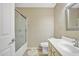 Bathroom showcasing a shower/bath combo, toilet, and vanity, with a neutral color scheme at 9609 E Monte Ave, Mesa, AZ 85209