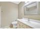 Bathroom featuring a single vanity, toilet, and shower/bath combo, with a neutral color scheme at 9609 E Monte Ave, Mesa, AZ 85209
