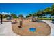 Spacious community playground area with various play structures and soft landing at 9609 E Monte Ave, Mesa, AZ 85209