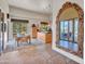 Bright and airy kitchen with a center island and breakfast nook overlooking the lush backyard at 10040 E Happy Valley Rd # 449, Scottsdale, AZ 85255