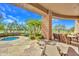 Covered patio overlooking a hot tub and desert landscaping at 10040 E Happy Valley Rd # 449, Scottsdale, AZ 85255