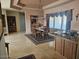 View of dining room, chandelier, cabinets, rug, and windows with decorative curtains at 10236 W Westwind Dr, Peoria, AZ 85383