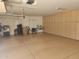 Spacious garage with built-in storage cabinets along the back wall at 10236 W Westwind Dr, Peoria, AZ 85383