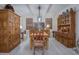 Bright dining room with natural wood furniture and décor pieces offering a warm, inviting space at 10545 E Texas Ave, Mesa, AZ 85212