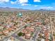 Aerial view of a community with mountains in the background, offering a picturesque setting at 10895 E Mission Ln, Scottsdale, AZ 85259