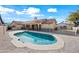 Backyard pool oasis with desert landscaping and patio area, perfect for relaxing and entertaining at 10895 E Mission Ln, Scottsdale, AZ 85259