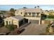 Charming two-story home boasting a three-car garage and tiled roof at 1180 E Ibis St, Gilbert, AZ 85297