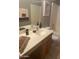 Bathroom featuring sink, a tiled tub, vanity, and modern fixtures at 12510 W Wells St, El Mirage, AZ 85335