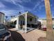 Charming manufactured home featuring a covered patio area perfect for outdoor relaxation and entertainment at 1281 S Sioux Dr, Apache Junction, AZ 85119