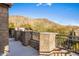 Outdoor balcony with stone railing and desert views at 13808 S Canyon Dr, Phoenix, AZ 85048