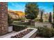 Inviting outdoor space with a modern fire pit, lush greenery, and scenic mountain views at 13808 S Canyon Dr, Phoenix, AZ 85048