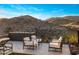 Relaxing outdoor seating area with a fire pit, perfect for enjoying the desert landscape views at 13808 S Canyon Dr, Phoenix, AZ 85048