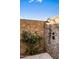 Private outdoor shower featuring stone wall and modern fixtures at 13808 S Canyon Dr, Phoenix, AZ 85048