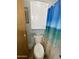 Standard toilet with overhead storage cabinet in bathroom at 1506 S Omaha Dr, Apache Junction, AZ 85119