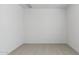 This is a empty bedroom with neutral carpet and natural light from a vent above at 17745 W Carol Ave, Waddell, AZ 85355