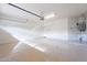 A spacious garage with clean epoxy floors at 18430 E Ashridge Dr, Queen Creek, AZ 85142