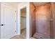 Modern walk-in shower, linen closet and walk-in closet are all easily accessible at 18430 E Ashridge Dr, Queen Creek, AZ 85142