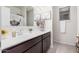 Bathroom with modern vanity, sink, and decorations at 18434 W Chama Dr, Surprise, AZ 85387