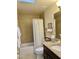 A well-maintained bathroom featuring a shower-tub combo and dark wood vanity at 18753 E Chinle Dr, Rio Verde, AZ 85263