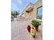 Front entrance and porch area with desert landscaping and tiled flooring at 18753 E Chinle Dr, Rio Verde, AZ 85263