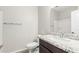 Bathroom with granite countertop vanity, large mirror, and shower at 1997 E Brooklyn Dr, Casa Grande, AZ 85122