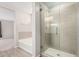 Bathroom showcases a separate shower with glass surround and soaking tub, accented by neutral tile at 1997 E Brooklyn Dr, Casa Grande, AZ 85122