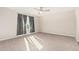 Bedroom with carpet, neutral walls, ceiling fan, and a window with curtains at 1997 E Brooklyn Dr, Casa Grande, AZ 85122