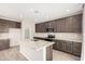 Beautiful kitchen with granite countertops, stainless steel appliances, and tiled backsplash at 1997 E Brooklyn Dr, Casa Grande, AZ 85122