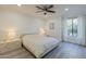 Main bedroom featuring a ceiling fan and large window with natural light at 2025 E Campbell Ave # 265, Phoenix, AZ 85016