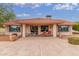 Inviting patio with comfortable seating, ideal for outdoor dining and relaxation in a private setting at 20603 N Stonegate Dr, Sun City West, AZ 85375