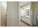 Bathroom featuring a walk in shower and white cabinets at 25409 N Ranch Gate Rd, Scottsdale, AZ 85255