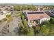 Aerial shot showcasing a private backyard with a patio, hot tub, and desert landscaping at 29816 N 129Th Gln, Peoria, AZ 85383