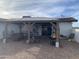 Outdoor patio with covered pergola, comfortable seating area, and brick pavers at 32628 N 163Rd Ave, Surprise, AZ 85387