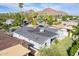 Beautiful home featuring a new roof and lush landscaping with stunning mountain views at 4241 E Montecito Ave, Phoenix, AZ 85018