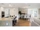 Bright and airy dining area with modern furnishings and stylish decor, open to the kitchen and living spaces at 4241 E Montecito Ave, Phoenix, AZ 85018