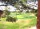 View of golf course seen through trees at 4303 E Cactus Rd # 331, Phoenix, AZ 85032