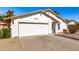 Charming single-story home with desert landscaping, a two-car garage, and a welcoming front entrance at 4436 W Morrow Dr, Glendale, AZ 85308