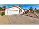 Charming single-story home with desert landscaping, a two-car garage, and a welcoming front entrance at 4436 W Morrow Dr, Glendale, AZ 85308