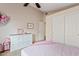 Bedroom with a white dresser and closet, providing ample storage and a serene atmosphere at 4514 E Mazatzal Dr, Cave Creek, AZ 85331