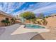 Inviting backyard pool with desert landscaping, spacious patio, and block fence for privacy at 4514 E Mazatzal Dr, Cave Creek, AZ 85331