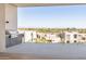 Expansive balcony with built-in grill overlooking city and mountain views at 5000 N Camelback Ridge Dr # 304, Scottsdale, AZ 85251