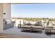 Spacious patio with grill and outdoor seating with mountain views at 5000 N Camelback Ridge Dr # 304, Scottsdale, AZ 85251