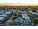 Aerial view of the neighborhood showcasing community pool, pavilion, and mature landscaping at 535 S Alma School Rd # 60, Mesa, AZ 85210