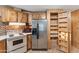 A view of the kitchen showing a pantry with shelves for storage at 535 S Alma School Rd # 60, Mesa, AZ 85210