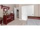 Bedroom featuring a red dresser with a display case and a sliding door closet at 6442 W Cavedale Dr, Phoenix, AZ 85083