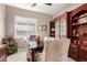 Elegant dining room with a display cabinet and neutral decor at 6442 W Cavedale Dr, Phoenix, AZ 85083